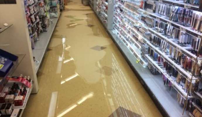 Water on the granite floor of a commercial building