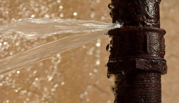 Water coming out of broken water pipe